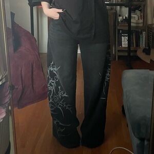 Minga London Black wide leg jeans with cyber sigilism graphic